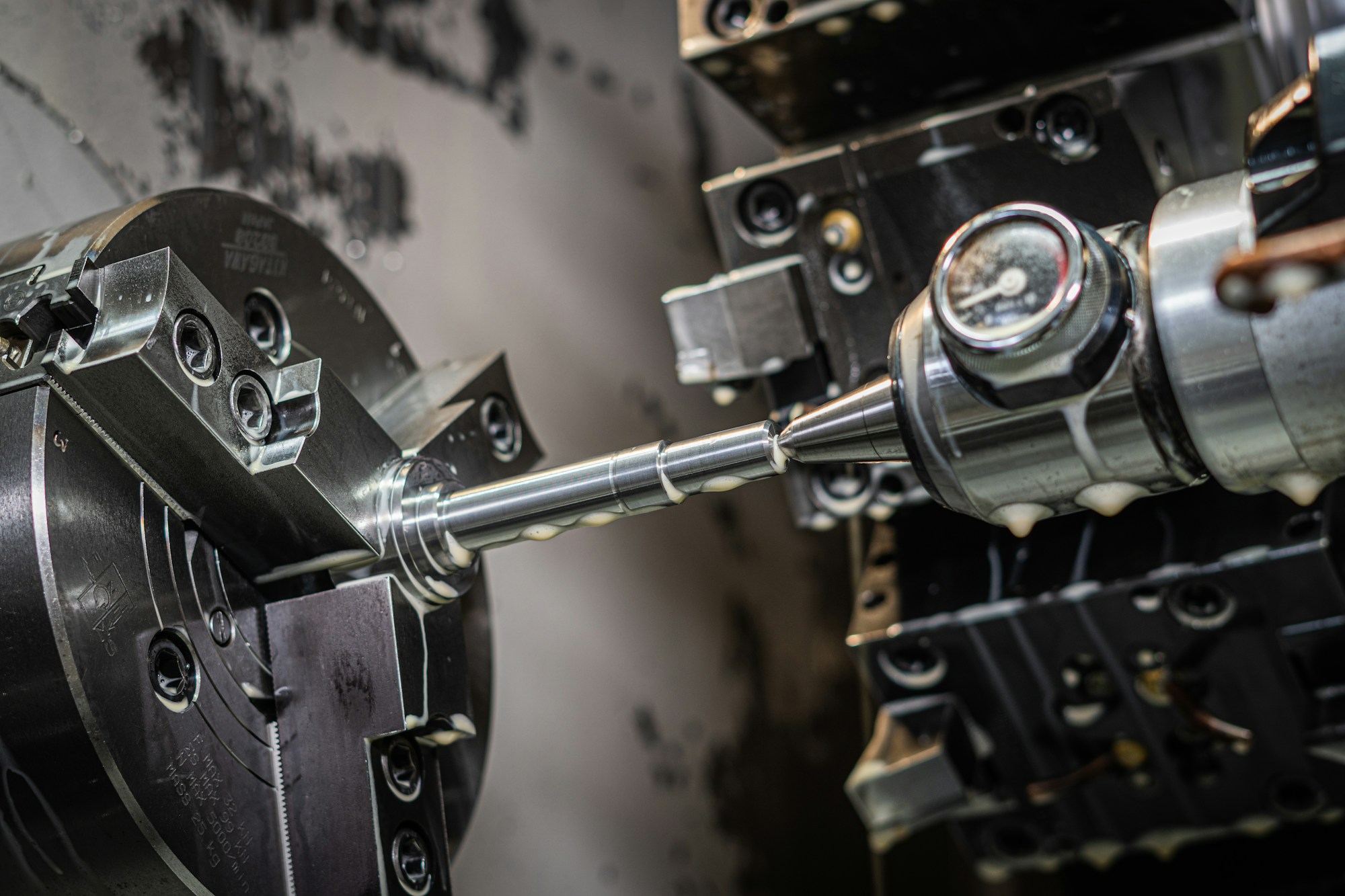 Precision shaft machining inside a CNC lathe